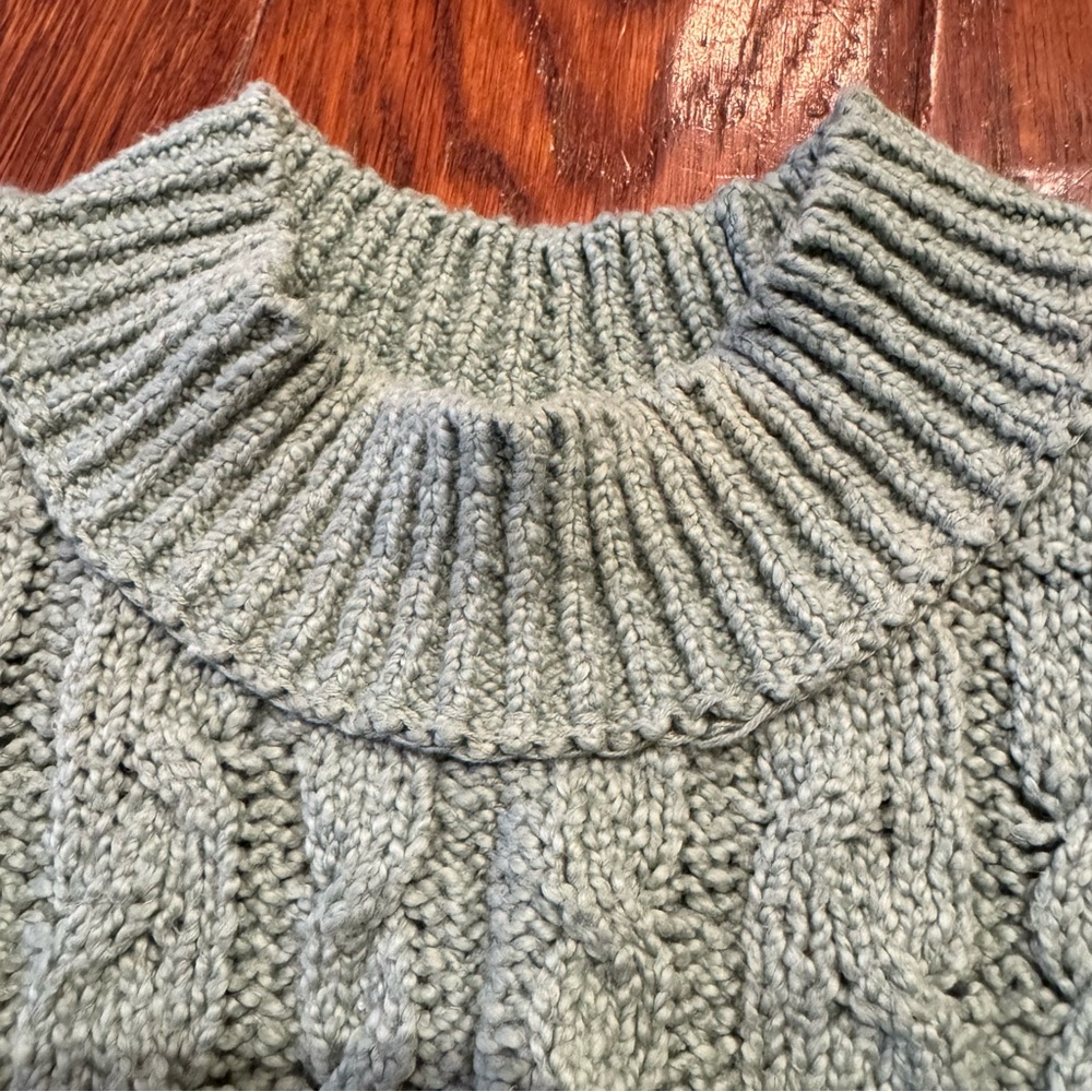 Free People Cropped Cable Knit Sleeveless Turtleneck Sweater in Mountain Mint - Picture 4 of 9